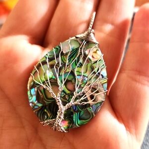 Iridescent tear drop with wire wrap tree Of Life pendant